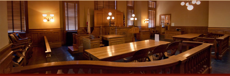 image-LITIGATION CONSULTING, EXPERT WITNESS SERVICES, COURT REFEREE APPOINTMENTS. A courtroom with wooden furnature in California